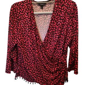 Dress barn dressy top red n black with sparkles and beaded hem